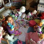CH surrounded by stuffies