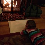 CH drawing in front of fireplace